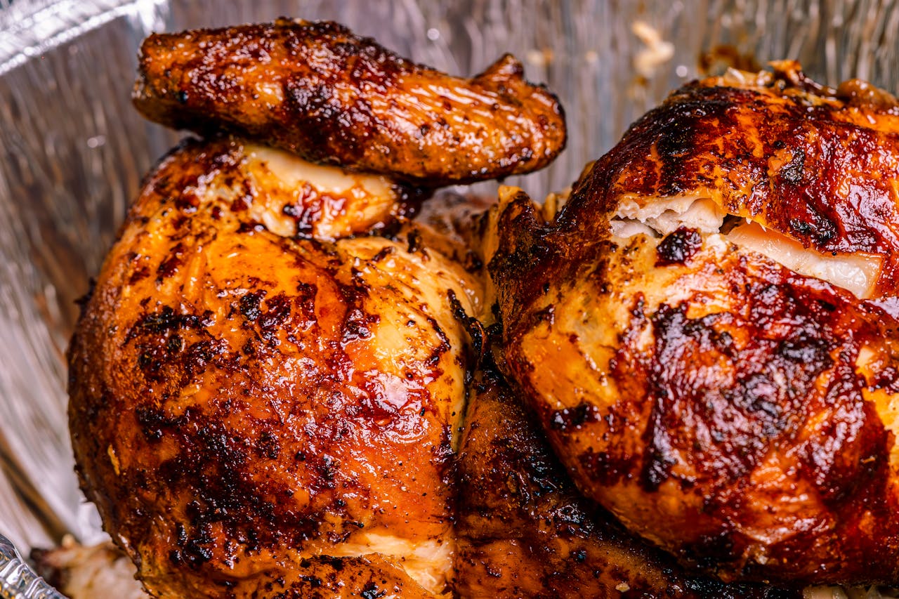 our-services-1 Deliciously roasted rotisserie chicken with crispy skin, perfect for a hearty meal.